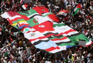 Egyptian demonstrators hold the flags of Arab nations at Cairo's Tahrir Square on May 13, 2011 during a protest calling for national unity after attacks on Egyptian churches, and solidarity with the Palestinians as they mark the "Nakba" or "catastrophe" which befell them following Israel's establishment in 1948. AFP PHOTO / KHALED DESOUKI